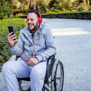 Man on a wheelchair having videocall