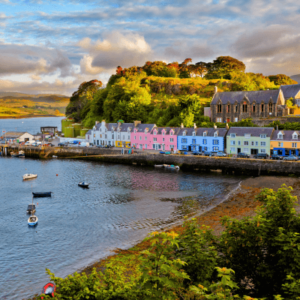 Quaint harbor town, vibrant colors, and rugged Scottish allure