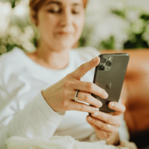 A woman using a modern smartphone