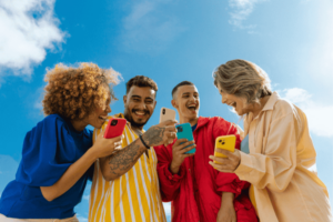 Outdoor Youths & Tech Friends Holding Phones Outdoors