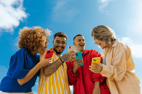 Outdoor Youths & Tech Friends Holding Phones Outdoors