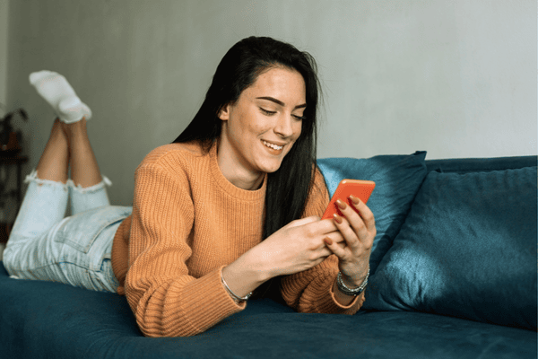Teenage girl using mobile phone