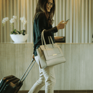 Business Traveler in Hotel Hallway with Phone