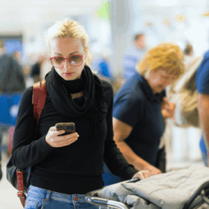 Female Traveler Using Phone 