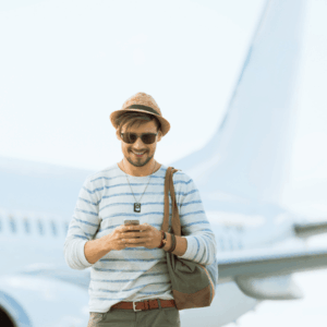 Tourist at airport with phone