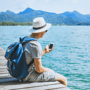 Tourist traveler using mobile phone