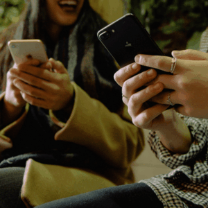 Women Using Their Phones