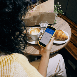 Woman Using a Mobile Finance App