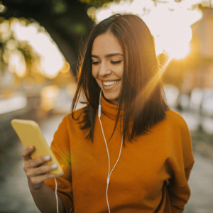 Cute woman using phone