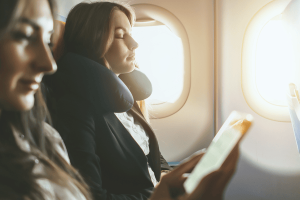 Two females going on business trip by plane