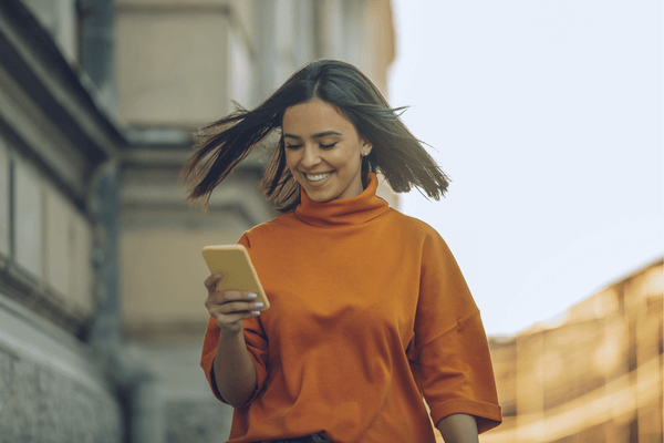 Young woman using phone
