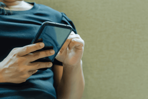 Sitting and Touching the Mobile Phone
