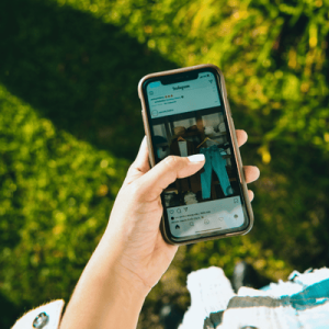 Photo of Person Using Mobile Phone
