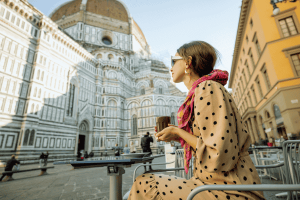 Woman at a Cafe Near Duomo Cathedral in Florence, Italy