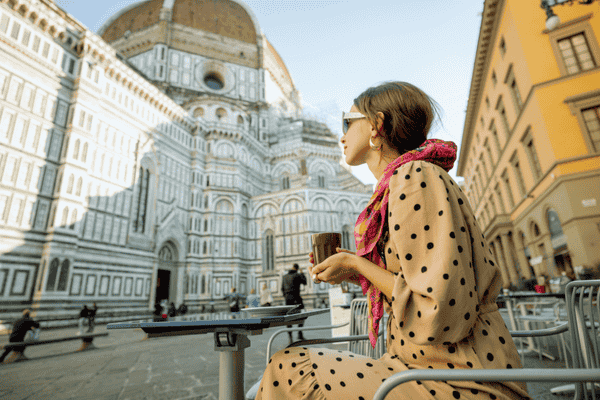 Woman at a Cafe Near Duomo Cathedral in Florence, Italy