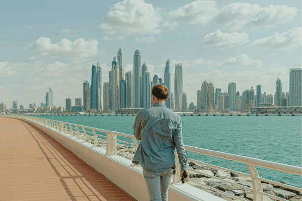 Man Walking Along Dubai Marina Promenade
