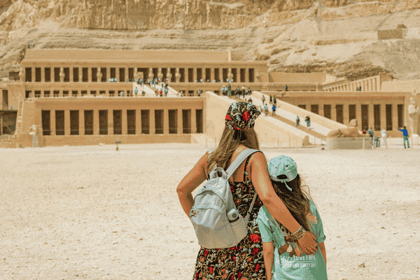 Woman with Her Daughter in front of the Mortuary Temple of Hatshepsut, Deir el-Bahari, Egypt