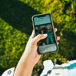 Photo of Person Using Mobile Phone