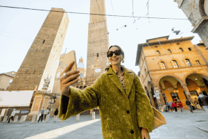 Woman Taking a Selfie While Traveling in Bologna City, Italy