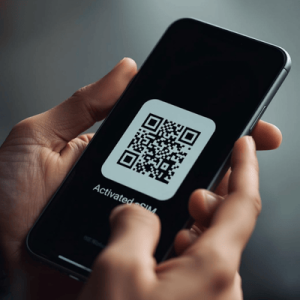 a hand holding a mobile phone with eSIM activated QR code