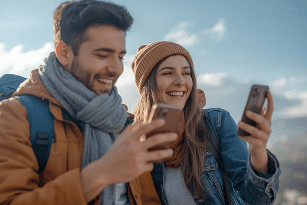 a traveler man/woman abroad happy using mobile phone