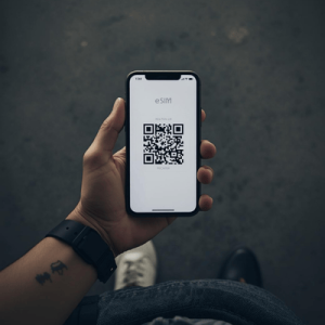 traveler holding mobile phone with eSIM QR code