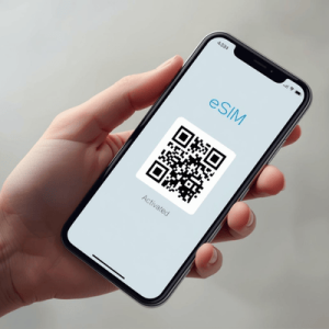 a hand holding smartphone with eSIM QR activated