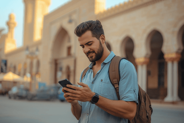 a tourist traveling in Abu Dhabi, using a smartphone