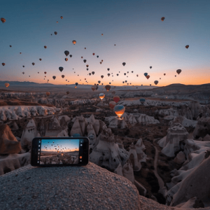 Scenic view of hot air balloons in Cappadocia, Turkey, representing reliable eSIM data coverage for travelers
