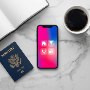 Top-down view of a smartphone showing dual-SIM signal icons next to a passport and coffee